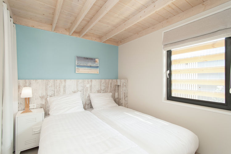 Villapparte-Belvilla-Vakantiehuis Sea Lodge in Bloemendaal-knusse zee lodge voor 4 personen-romantische slaapkamer